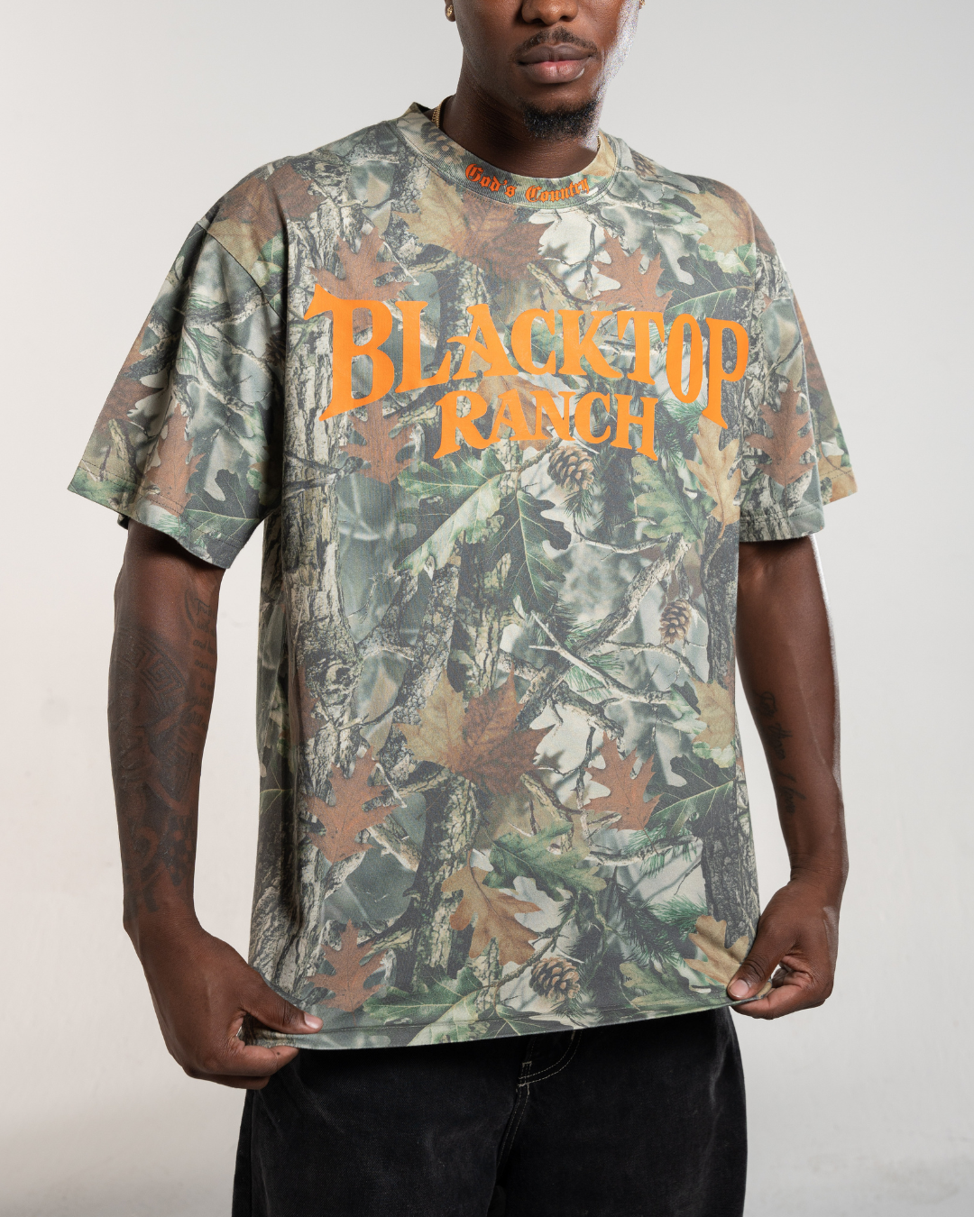Blacktop Ranch Take The Shot forest camo t-shirt with relaxed streetwear fit