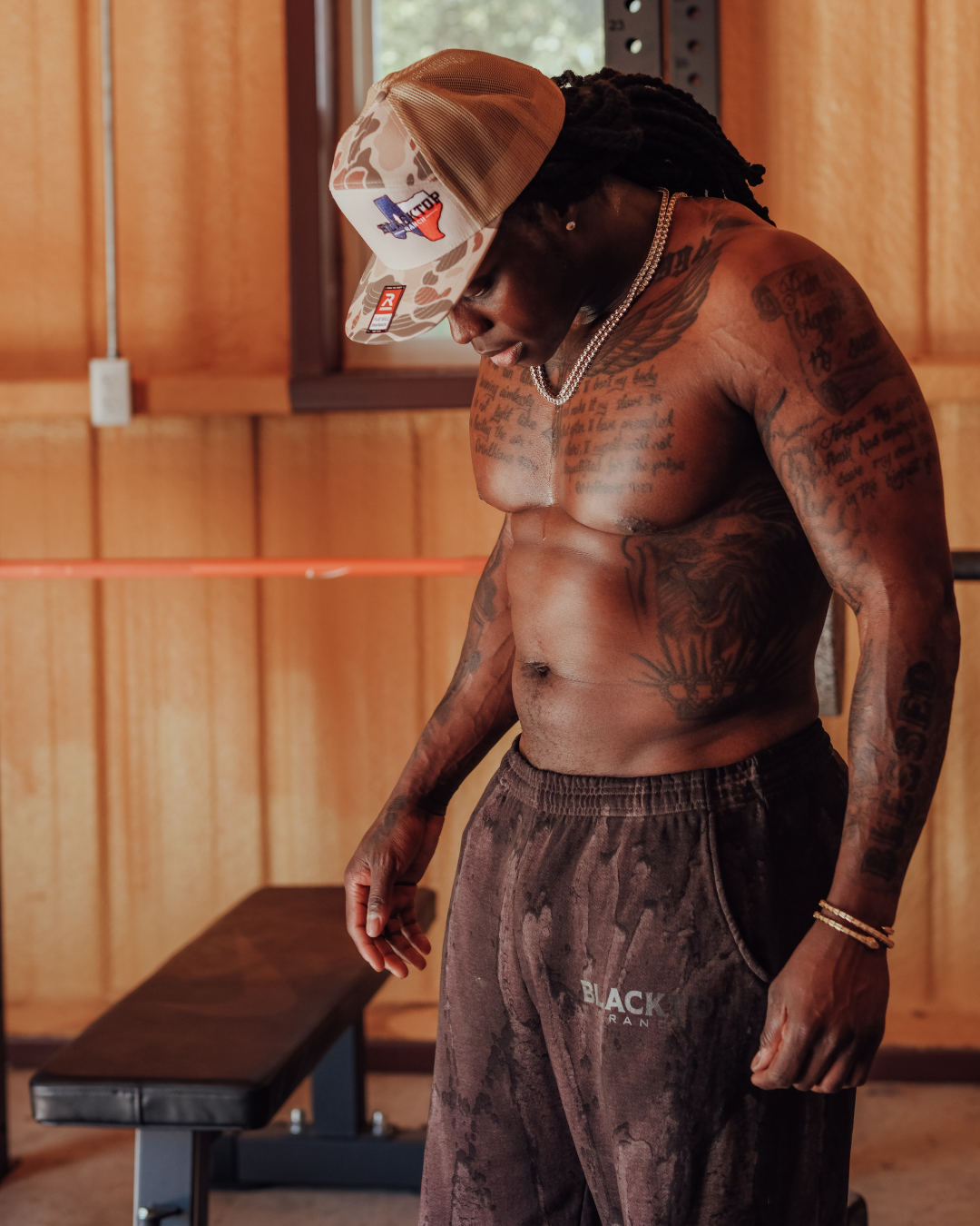 Side profile of BTR drip dye sweats loose fit streetwear silhouette