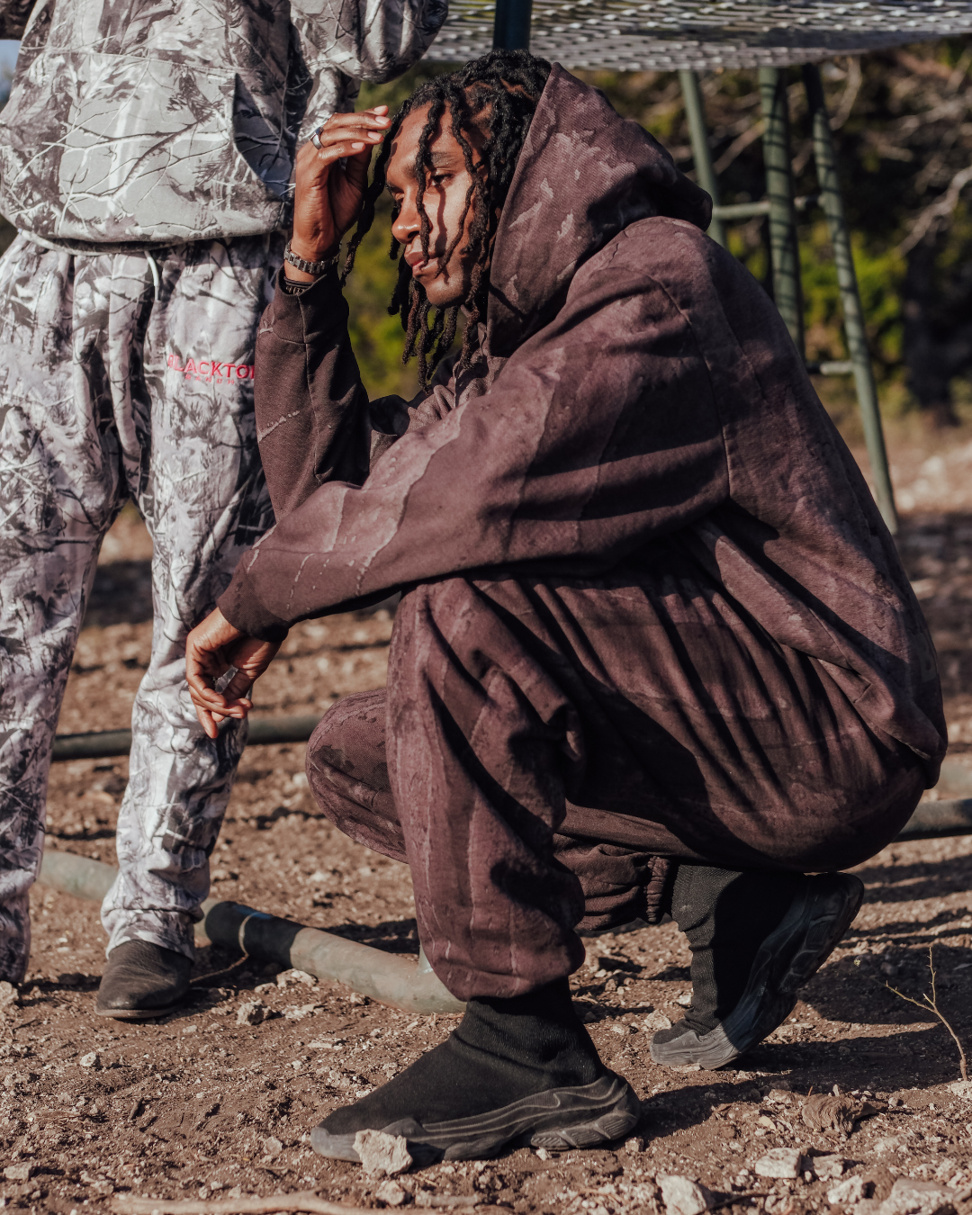 Blacktop Ranch relaxed sweatpants styled in natural lighting western streetwear look