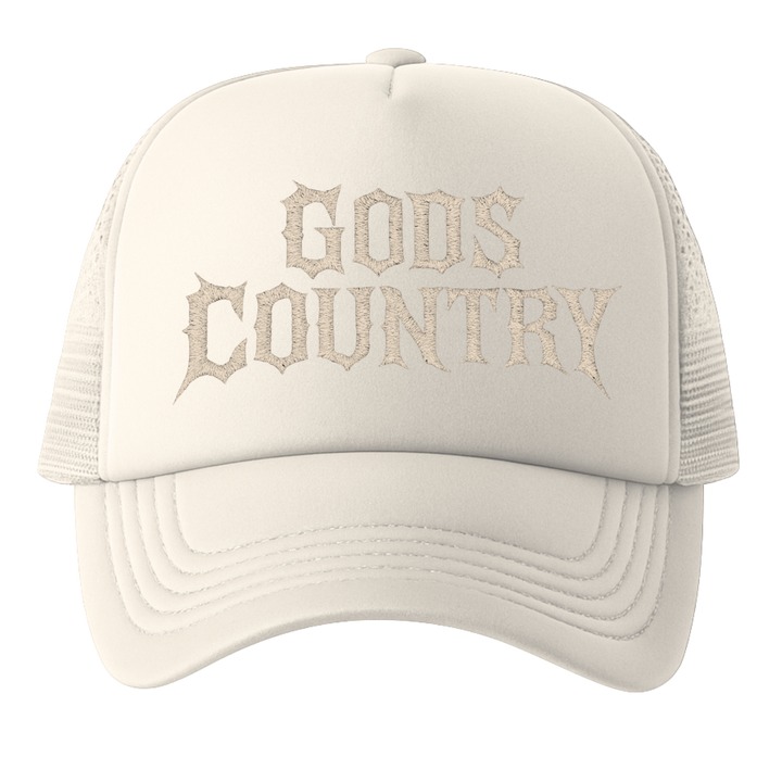 Close-up of “God’s Country” embroidery on creme Blacktop Ranch hat