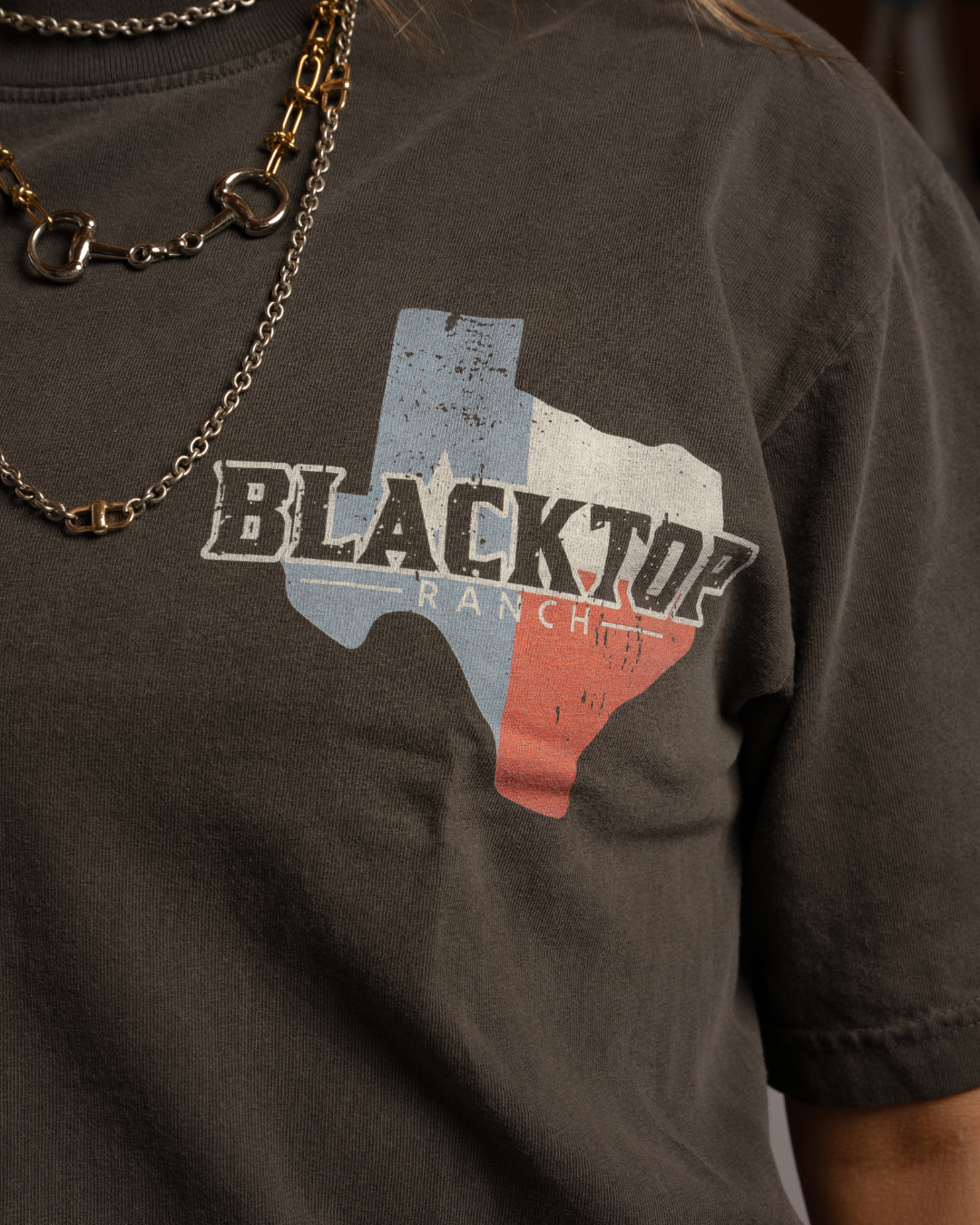 Close-up of Blacktop Ranch OG garment dyed t-shirt showing vintage dye texture