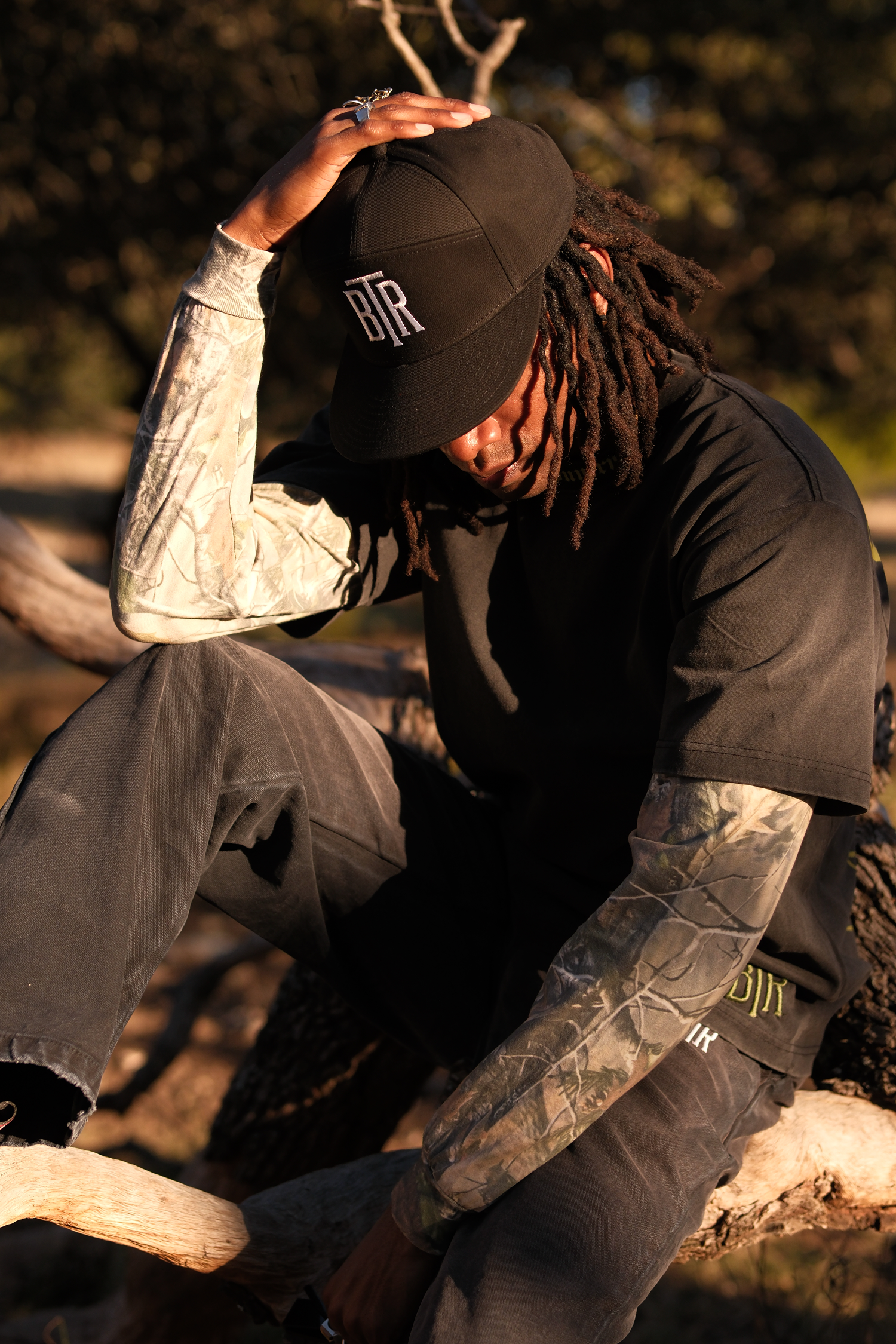 Vintage camo long sleeve shirt worn by Model Blacktop Ranch streetwear styling