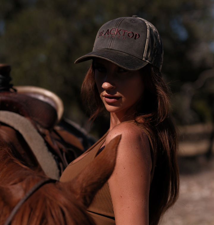 Blacktop Ranch camo cap featuring vintage wash and classic trucker fit